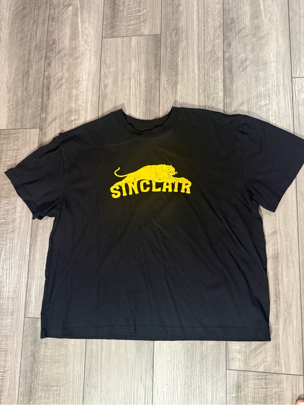 Sinclair Black Short-Sleeve Tee with Yellow Panther Graphic